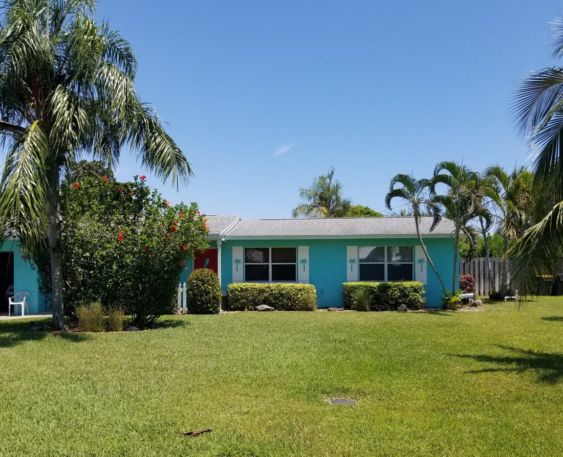 Bringing the Beach Home: Custom Shutters with Beach-Themed Cutouts - High Springs Shutter Company
