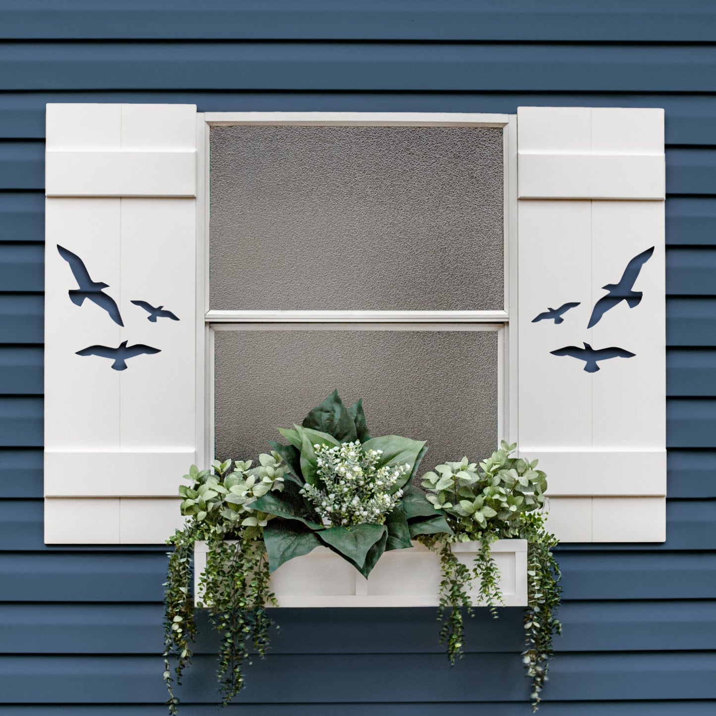 Shutters with flying birds cut out